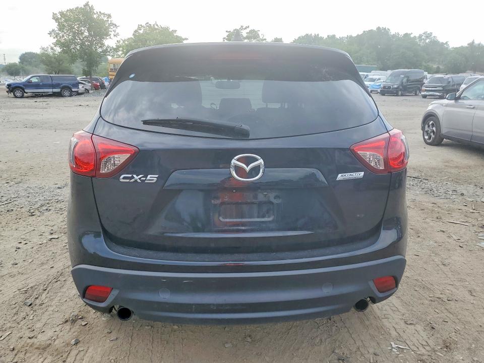 2013 Mazda Cx-5 VIN JM3KE2DE6D0167116 COPART salvage auction — SIDE, Md - Cert Of Salvage > 75% Damage, sold $3,550 on 2026-07-28 (photo 6)