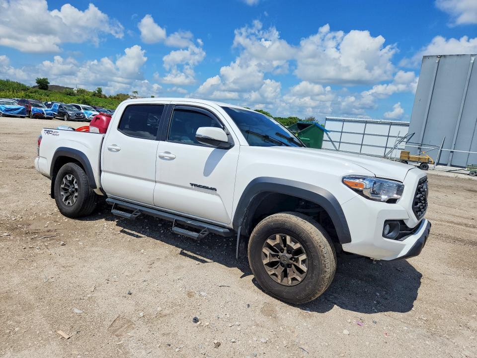 2021 Toyota Tacoma VIN 5TFAZ5CNXMX113983 COPART salvage auction — REAR END, Fl - Cert Of Title Slvg Rebuildable, sold $7,200 on 2026-07-14 (photo 4)