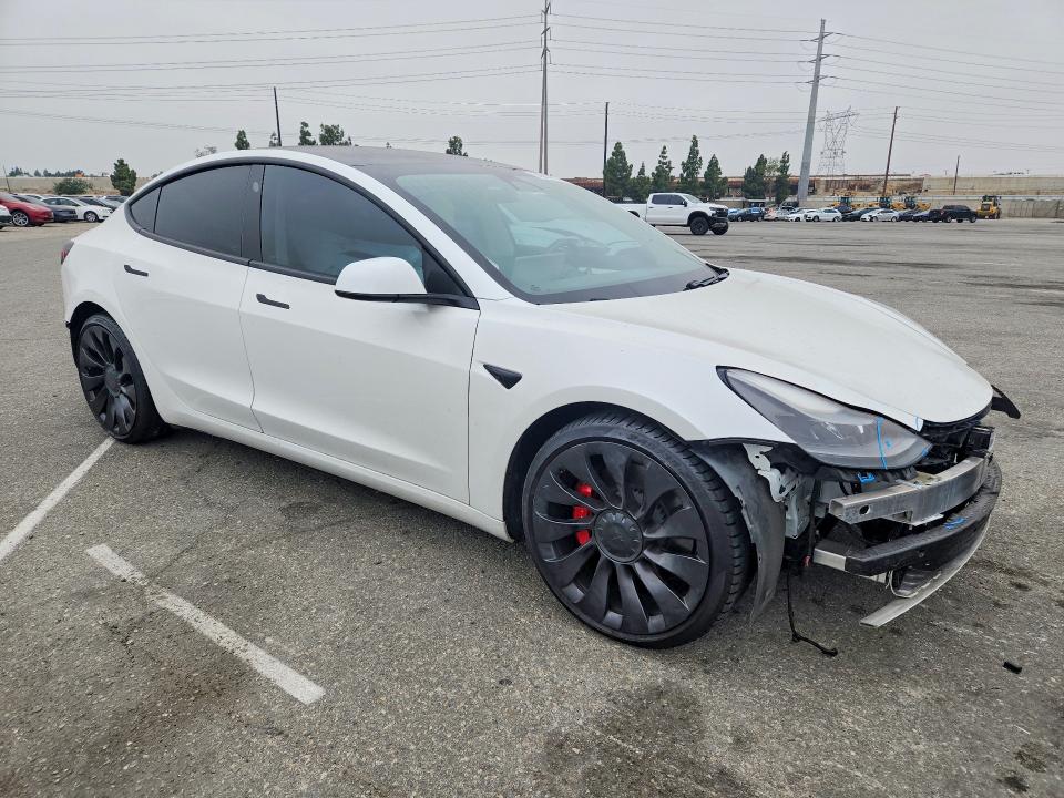 2021 Tesla Model 3 VIN 5YJ3E1EC9MF077884 COPART salvage auction — REAR END, CA - SALVAGE CERTIFICATE, sold $500 on 2026-07-21 (photo 4)