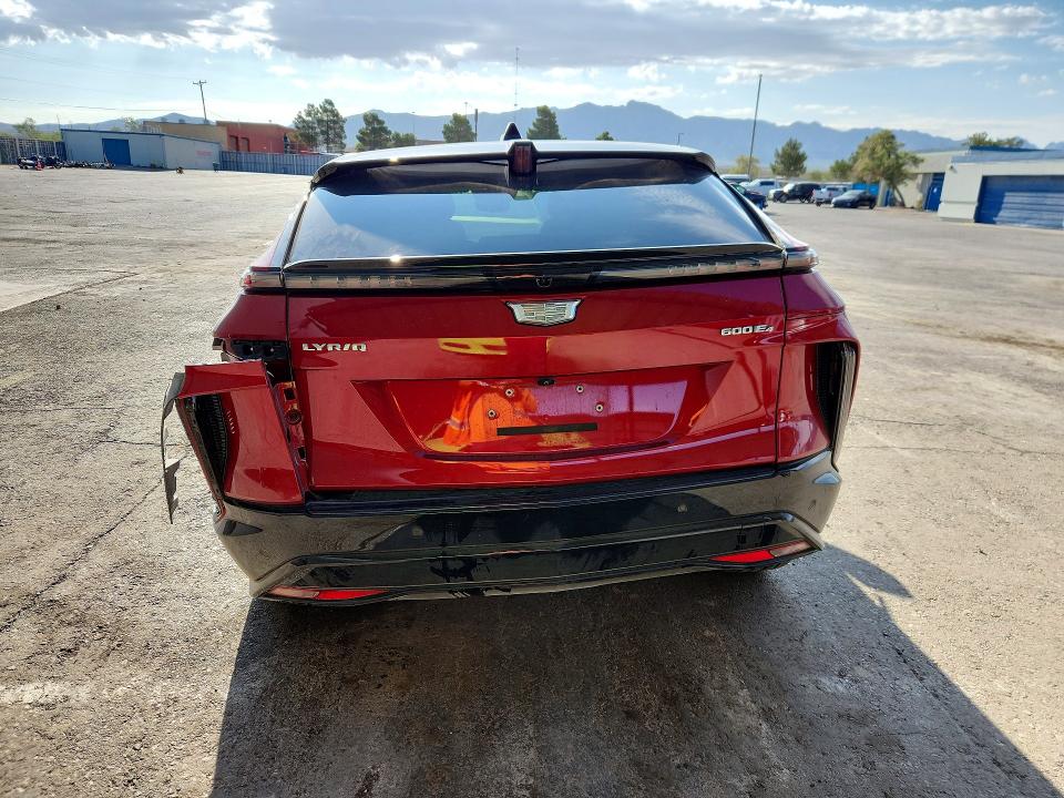 2024 Cadillac Lyriq VIN 1GYKPWRL4RZ135022 COPART salvage auction — ALL OVER, Tx - Salvage Vehicle Title, sold $13,300 on 2026-08-21 (photo 6)