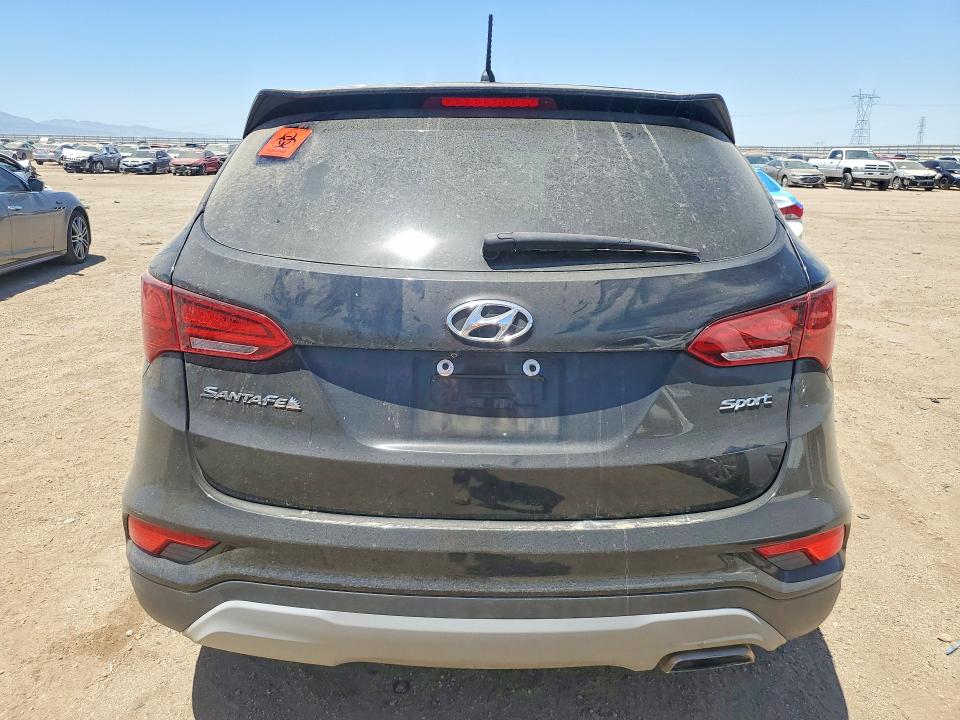 2018 Hyundai Santa fe VIN 5XYZT3LB8JG568733 COPART salvage auction — INTERIOR BURN, Ca - Dis/Dlr/Exp Only Clean Title, sold $1,500 on 2026-07-20 (photo 6)