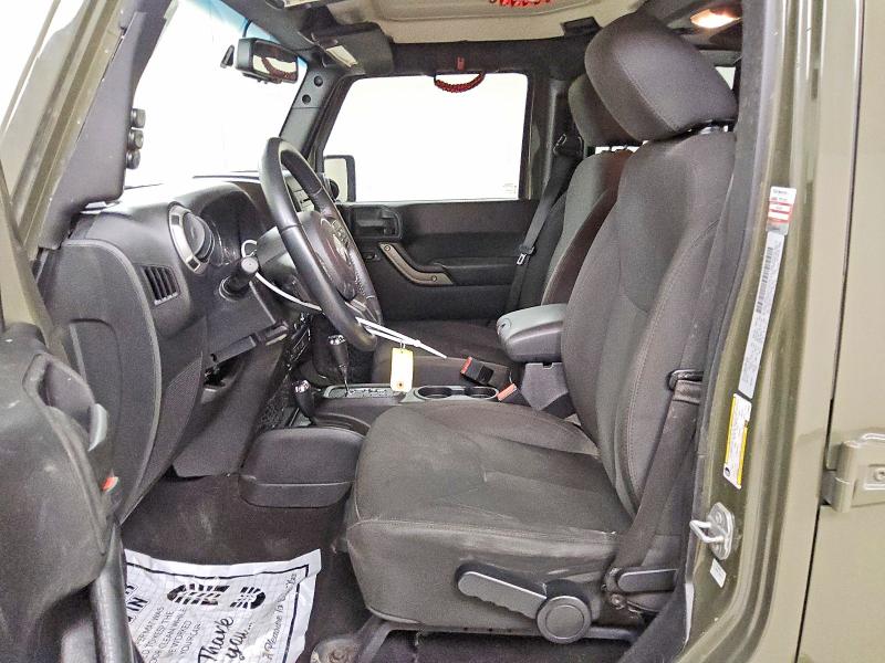 2015 Jeep Wrangler unlimited VIN 1C4BJWDG1FL760932 COPART salvage auction — MINOR DENT/SCRATCHES, Tx - Certificate Of Title, sold $3,750 on 2026-07-09 (photo 7)