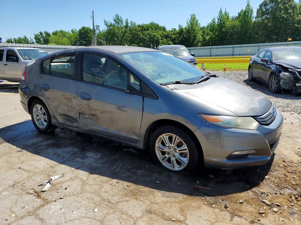 2010 Honda Insight VIN JHMZE2H7XAS017351 COPART salvage auction — NORMAL WEAR, Tn - Salvage Certificate, sold $300 on 2026-07-09 (photo 4)