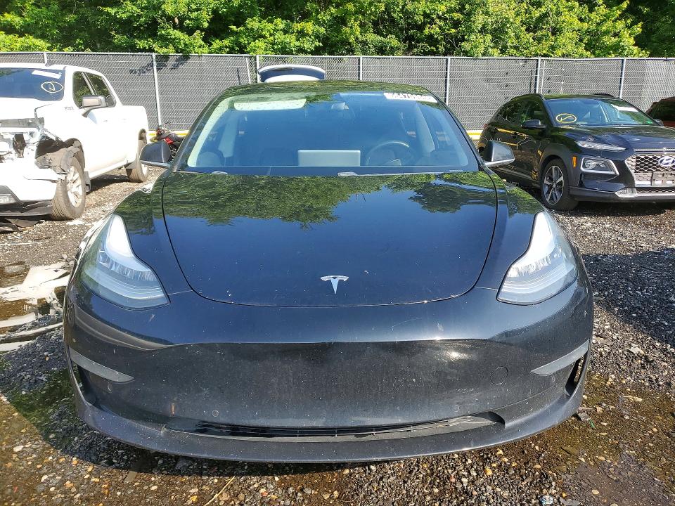 2018 Tesla Model 3 VIN 5YJ3E1EA8JF152035 COPART salvage auction — MINOR DENT/SCRATCHES, WV - CERTIFICATE OF TITLE, sold $8,600 on 2026-07-07 (photo 5)