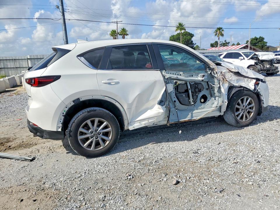 2023 Mazda Cx-5 VIN JM3KFBCM1P0220086 COPART salvage auction — SIDE, Fl - Certificate Of Destruction, sold $6,600 on 2026-07-31 (photo 3)