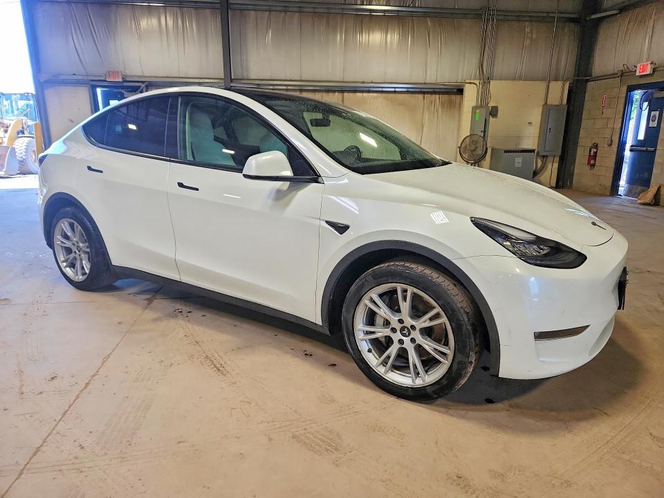 2021 Tesla Model y VIN 5YJYGDED2MF109150 COPART salvage auction — NORMAL WEAR, Wv - Certificate Of Title, sold $18,000 on 2026-07-23 (photo 4)