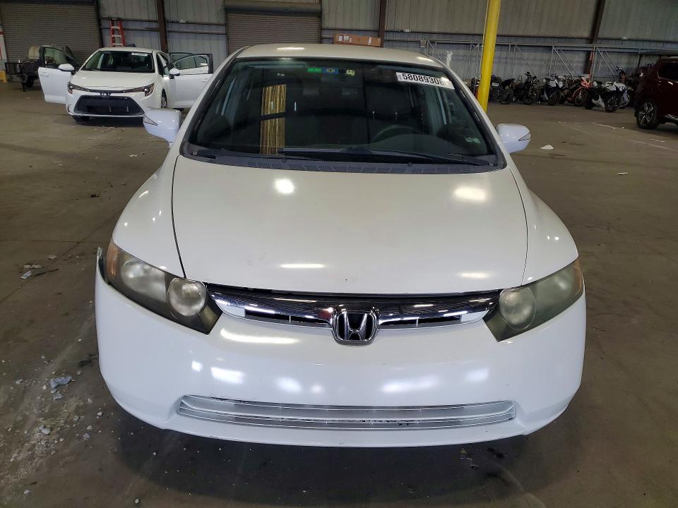 2010 Honda Civic hybrid VIN JHMFA3F22AS007411 COPART salvage auction — MECHANICAL, Fl - Cert Of Title Slvg Rebuildable, sold $400 on 2026-07-13 (photo 5)