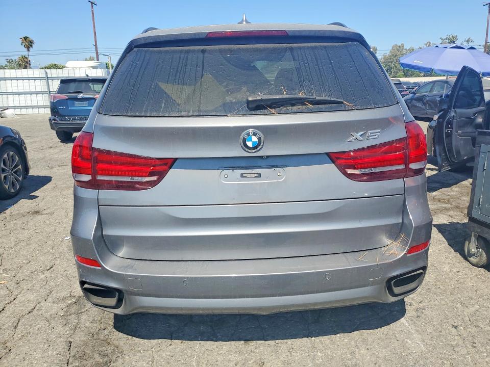 2015 BMW VIN 5UXKR6C51F0J75373 COPART salvage auction — MINOR DENT/SCRATCHES, Ca - Dis/Dlr/Exp Only Clean Title, sold $4,700 on 2026-07-27 (photo 6)