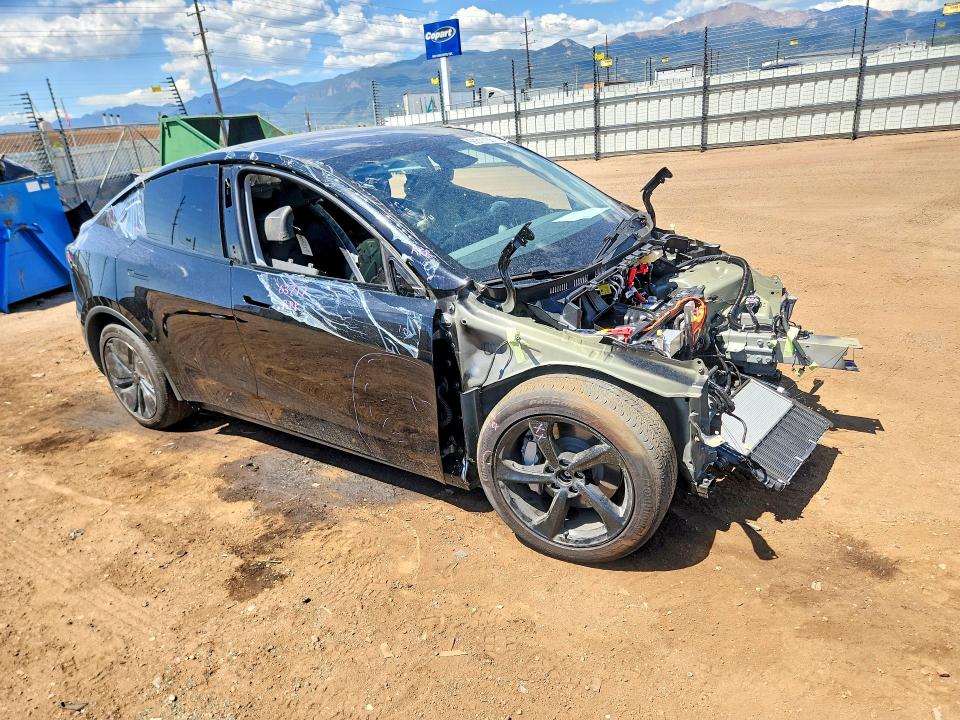 2026 Tesla Model y VIN 7SAYGDEE1TF413984 COPART salvage auction — ALL OVER, CO - SALVAGE TITLE, sold $14,800 on 2026-07-29 (photo 4)