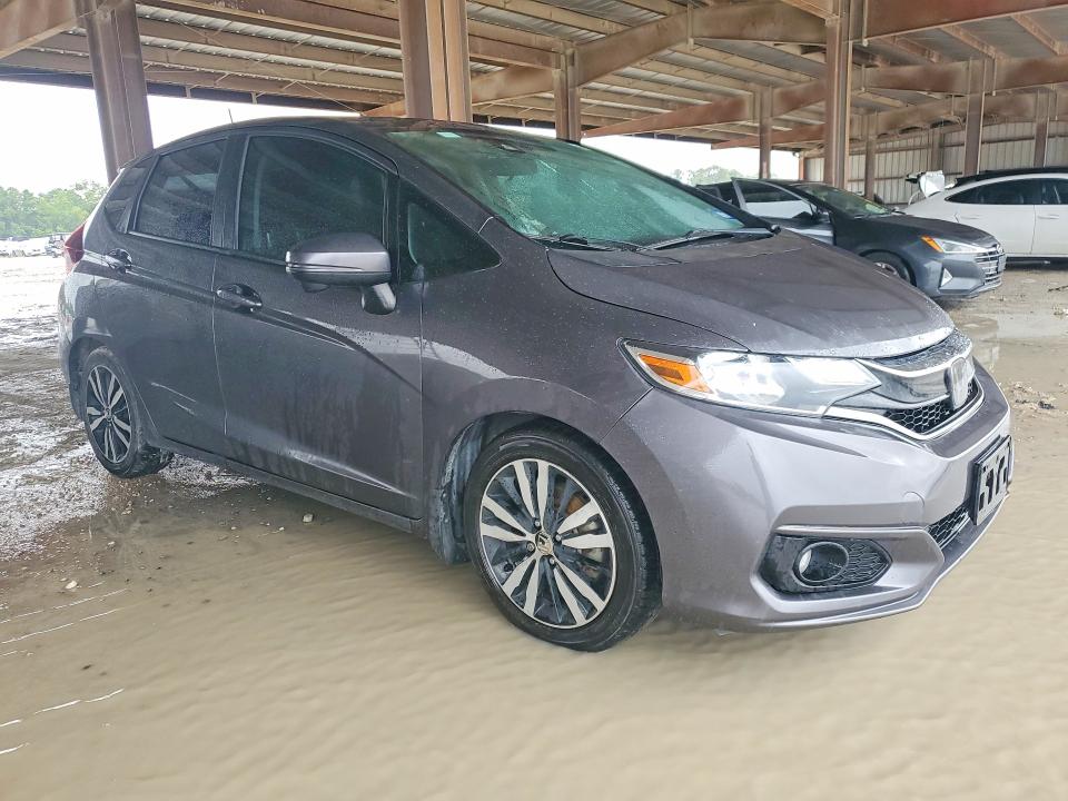 2018 Honda Fit VIN 3HGGK5H89JM719876 COPART salvage auction — WATER/FLOOD, Tx - Salvage Title-Flood Damage, sold $150 on 2026-08-21 (photo 4)