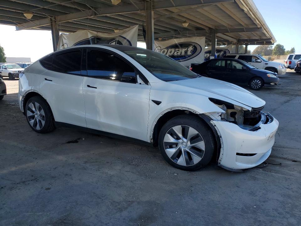 2023 Tesla Model y VIN 7SAYGDEE0PF744805 COPART salvage auction — FRONT END, CA - SALVAGE CERTIFICATE, sold $4,100 on 2026-07-28 (photo 4)