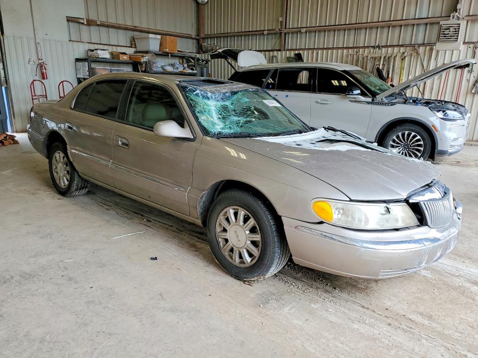 2001 Lincoln Continental VIN 1LNHM97V01Y720555 COPART salvage auction — FRONT END, TX - SALVAGE VEHICLE TITLE, sold $275 on 2026-07-17 (photo 4)