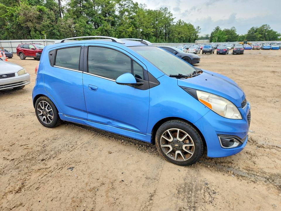 2013 Chevrolet VIN KL8CF6S9XDC567128 COPART salvage auction — MINOR DENT/SCRATCHES, Fl - Certificate Of Title, sold $775 on 2026-07-10 (photo 4)