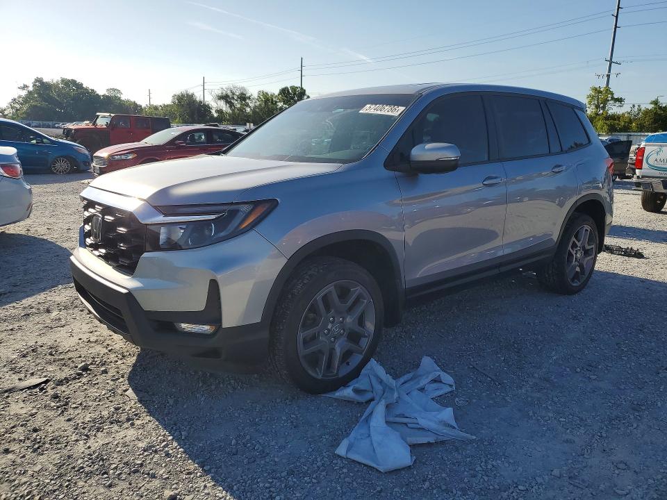 2023 Honda Passport VIN 5FNYF8H59PB028942 — COPART salvage auction photo
