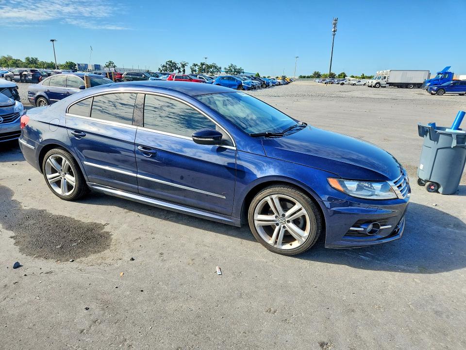 2013 Volkswagen VIN WVWBP7AN9DE561975 COPART salvage auction — MINOR DENT/SCRATCHES, Fl - Cert Of Title Slvg Rebuildable, sold $925 on 2026-07-20 (photo 4)