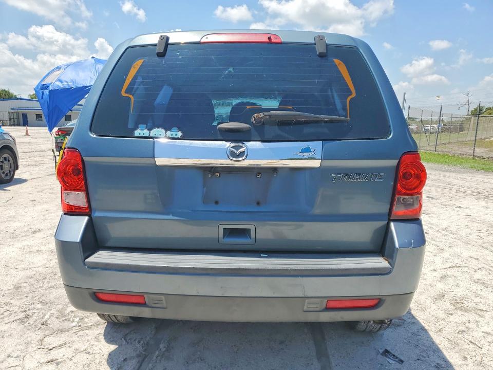 2011 Mazda Tribute VIN 4F2CY0C78BKM07294 COPART salvage auction — NORMAL WEAR, Fl - Certificate Of Title, sold $850 on 2026-07-08 (photo 6)