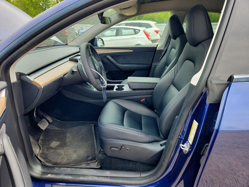 2023 Tesla Model y VIN LRWYGDEE0PC228256 COPART salvage auction — REAR END, ON - PERMIT SALVAGE, sold $10,700 on 2026-07-30 (photo 7)