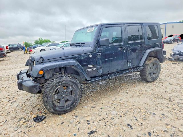 2009 Jeep Wrangler unlimited VIN 1J4GA59129L751093 COPART salvage auction — ENGINE BURN, Mi - Certificate Of Title, sold $725 on 2026-07-09 (photo 1)