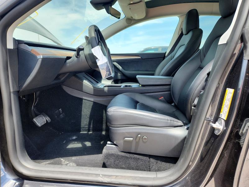 2024 Tesla Model y VIN 7SAYGDEDXRF050990 COPART salvage auction — REAR END, Fl - Cert Of Title Slvg Rebuildable, sold $8,600 on 2026-07-09 (photo 7)