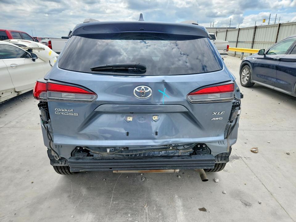 2023 Toyota Corolla cross VIN 7MUDAABG8PV070874 COPART salvage auction — REAR END, TX - SALVAGE VEHICLE TITLE, sold $7,200 on 2026-07-28 (photo 6)