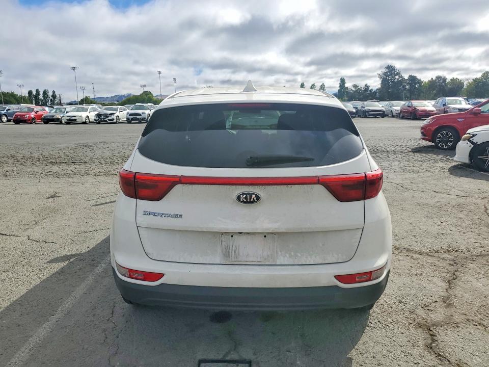 2018 Kia Sportage VIN KNDPMCAC8J7444474 COPART salvage auction — SIDE, Ca - Salvage Certificate, sold $2,950 on 2026-07-06 (photo 6)