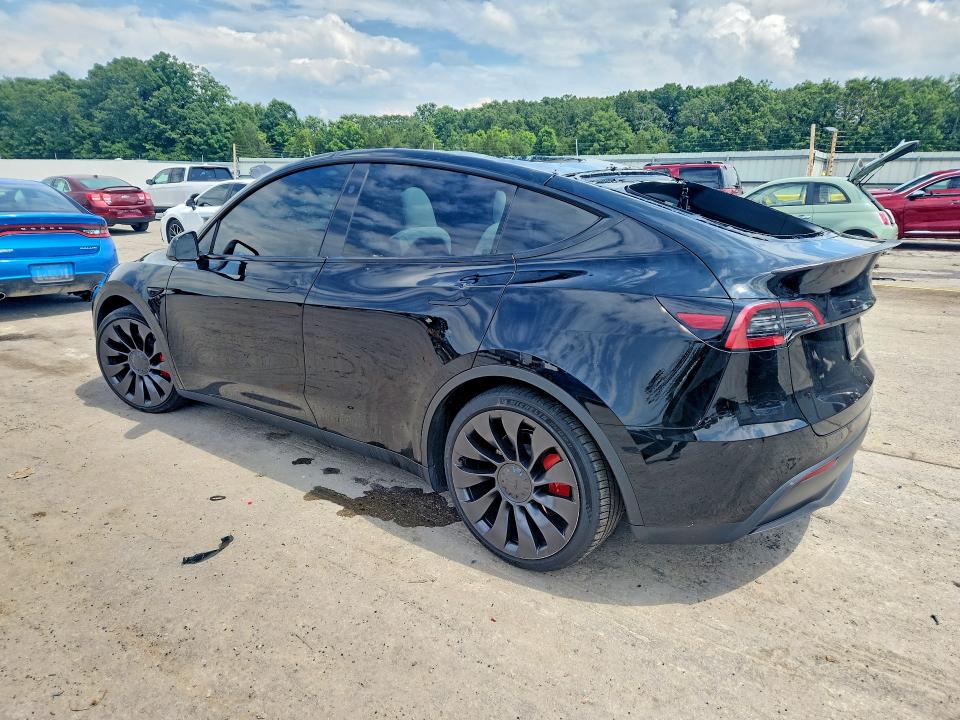 2023 Tesla Model y VIN 7SAYGDEF7PF892359 COPART salvage auction — HAIL, Mo - Salvage Certificate Of Title, sold $12,600 on 2026-07-29 (photo 2)