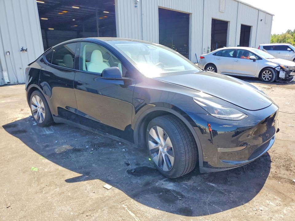 2023 Tesla VIN 7SAYGDEE3PA183545 COPART salvage auction — REAR END, Fl - Cert Of Title Slvg Rebuildable, sold $11,800 on 2026-07-17 (photo 4)
