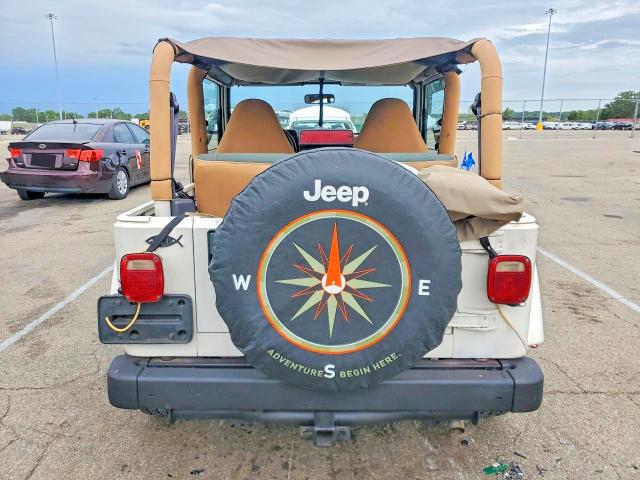 1997 Jeep Wrangler / VIN 1J4FY49S7VP520381 COPART salvage auction — MINOR DENT/SCRATCHES, Oh - Certificate Of Title, sold $2,400 on 2026-07-08 (photo 6)