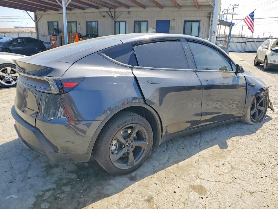 2026 Tesla Model y VIN 7SAYGDEE2TF574957 COPART salvage auction — ALL OVER, CA - SALVAGE CERTIFICATE, sold $12,200 on 2026-07-16 (photo 3)