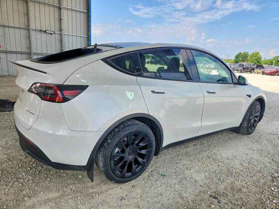 2023 Tesla Model y VIN 7SAYGDEE3PA207780 COPART salvage auction — HAIL, MO - SALVAGE CERTIFICATE OF TITLE, sold $12,800 on 2026-07-27 (photo 3)