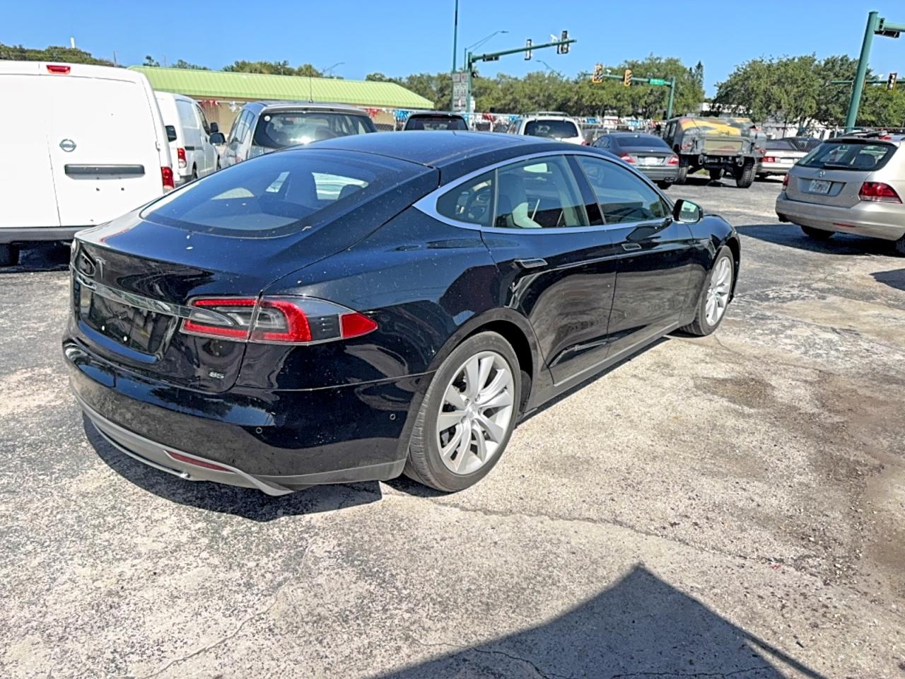 2014 Tesla Model S VIN 5YJSA1H1XEFP66125 COPART salvage auction — Normal Wear, FL - CERTIFICATE OF TITLE (P), sold $3,200 on 2026-07-01 (photo 4)