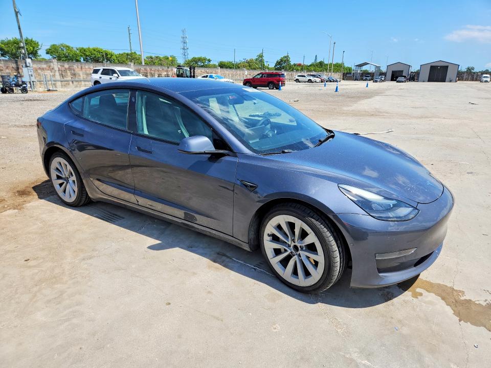 2022 Tesla Model 3 VIN 5YJ3E1EA2NF286853 COPART salvage auction — MECHANICAL, FL - CERTIFICATE OF TITLE, sold $8,500 on 2026-07-08 (photo 4)