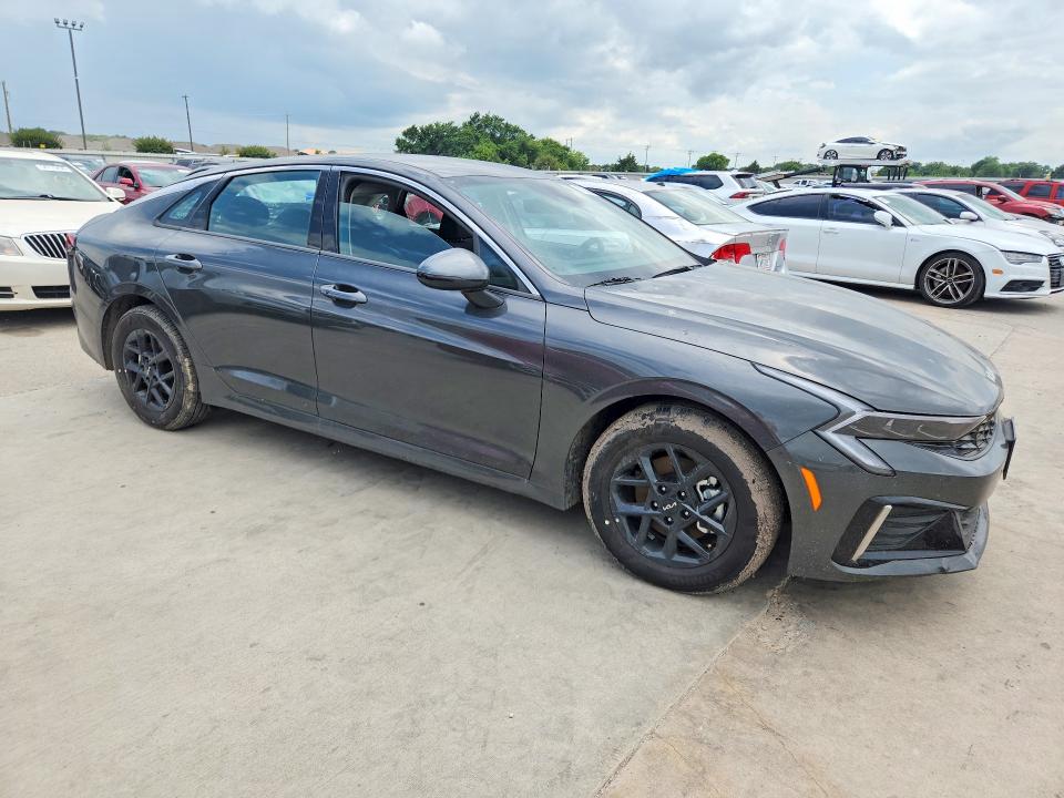 2026 Kia K5 VIN KNAG24J75T5410888 COPART salvage auction — WATER/FLOOD, TX - SALVAGE TITLE-FLOOD DAMAGE, sold $2,000 on 2026-07-30 (photo 4)