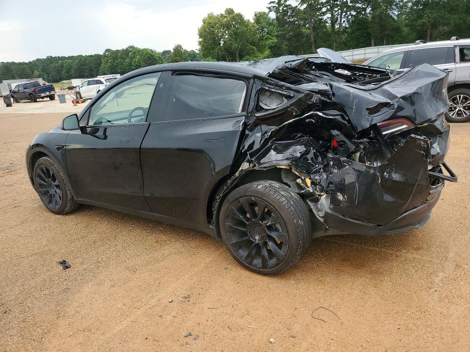 2023 Tesla VIN 7SAYGDEE8PA146961 COPART salvage auction — REAR END, TX - SALVAGE VEHICLE TITLE (P), sold $6,300 on 2026-07-20 (photo 2)