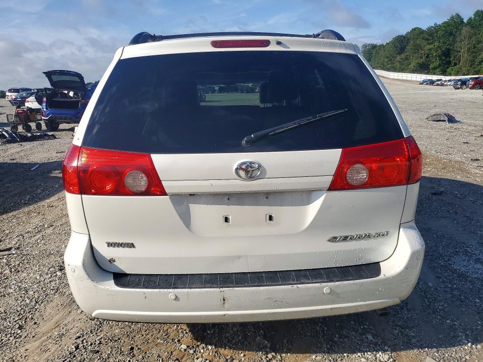 2010 Toyota Sienna VIN 5TDYK4CC3AS314704 COPART salvage auction — SIDE, Mt - Certificate Of Title, sold $725 on 2026-07-11 (photo 6)