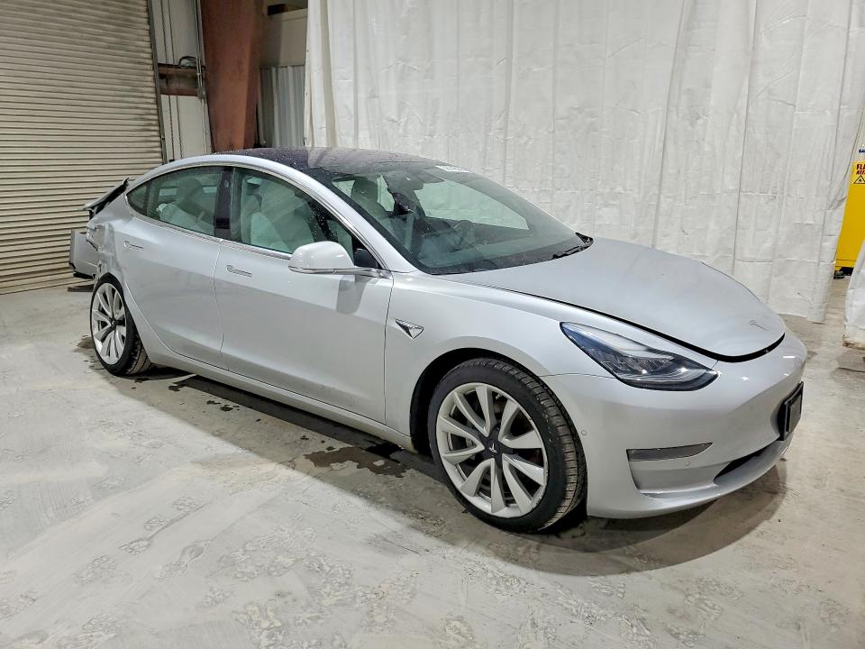 2018 Tesla Model 3 VIN 5YJ3E1EB1JF097257 COPART salvage auction — REAR END, Ny - Mv-907A Salvage Certificate, sold $3,800 on 2026-07-13 (photo 4)