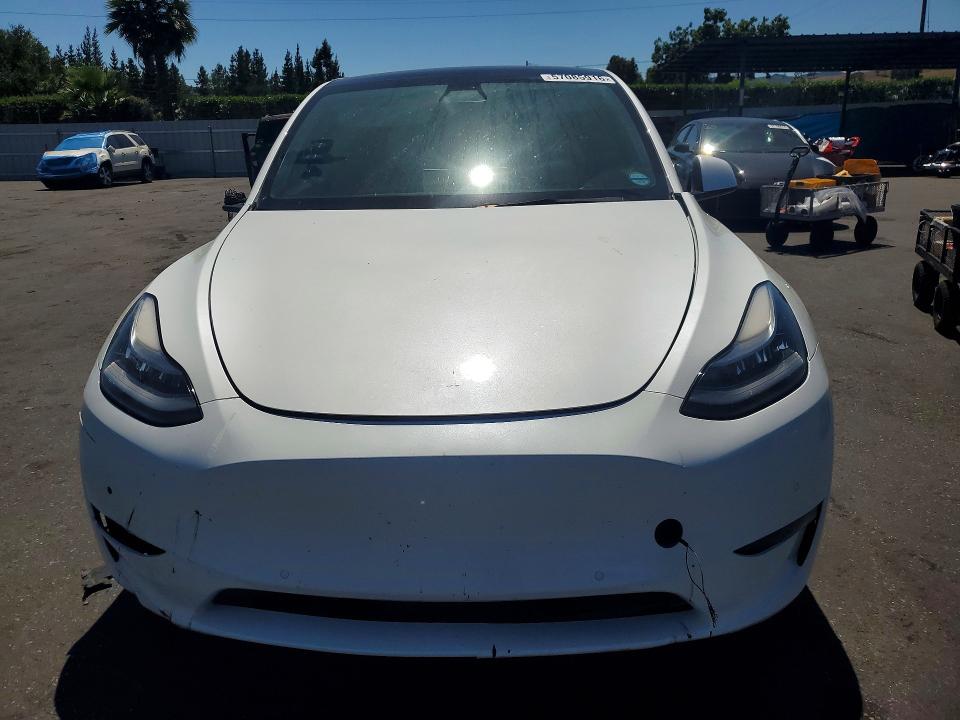 2021 Tesla Model y VIN 5YJYGAEE2MF189301 COPART salvage auction — FRONT END, Ca - Salvage Certificate, sold $90 on 2026-07-28 (photo 5)