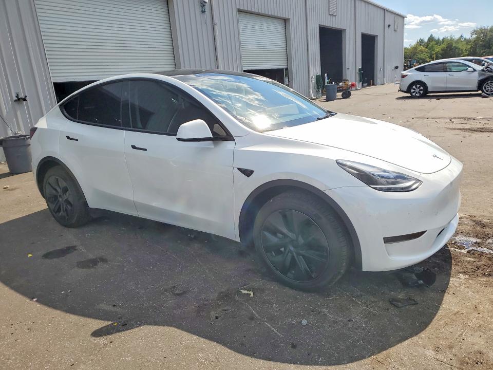 2024 Tesla Model y VIN 7SAYGDED8RA323132 COPART salvage auction — REAR END, Fl - Cert Of Title Slvg Rebuildable, sold $13,400 on 2026-07-20 (photo 4)