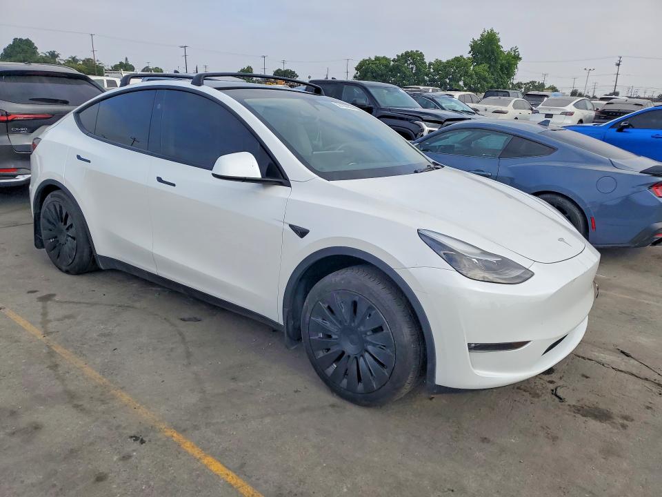 2023 Tesla Model y VIN 7SAYGAEE1PF881184 COPART salvage auction — REAR END, Ca - Salvage Certificate, sold $14,400 on 2026-07-29 (photo 4)