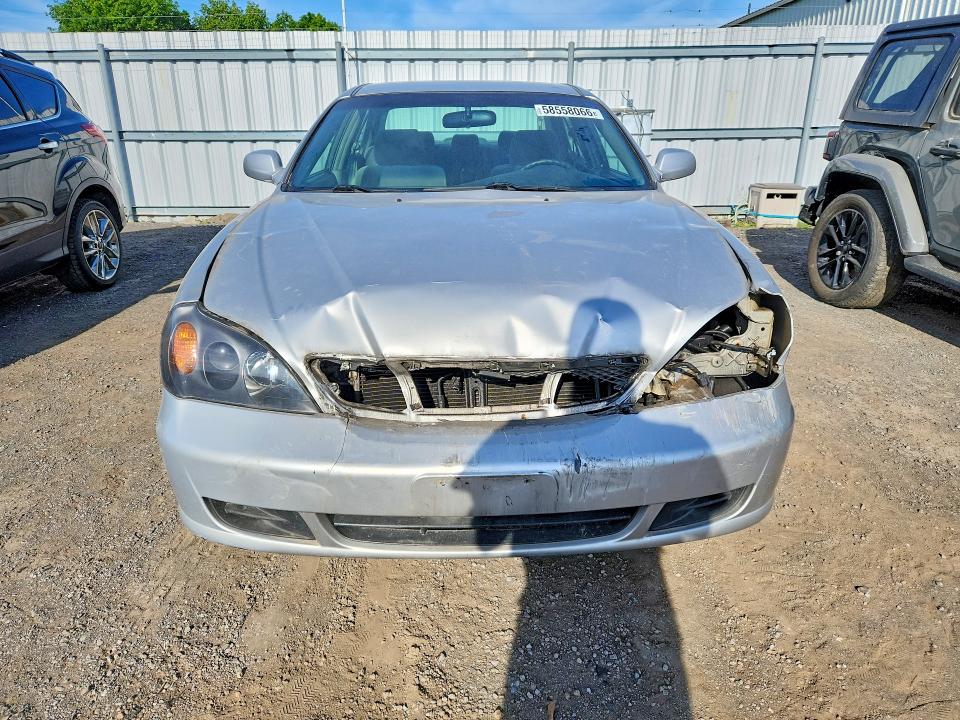 2004 Suzuki Verona VIN KL5VD52L44B106627 COPART salvage auction — FRONT END, ON - PERMIT NO BRAND - UNFIT, sold $325 on 2026-07-16 (photo 5)