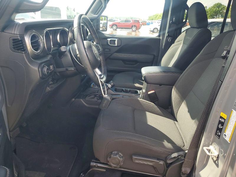 2023 Jeep Wrangler / VIN 1C4HJXEN0PW677098 COPART salvage auction — MINOR DENT/SCRATCHES, Mo - Certificate Of Title, sold $22,500 on 2026-07-02 (photo 7)