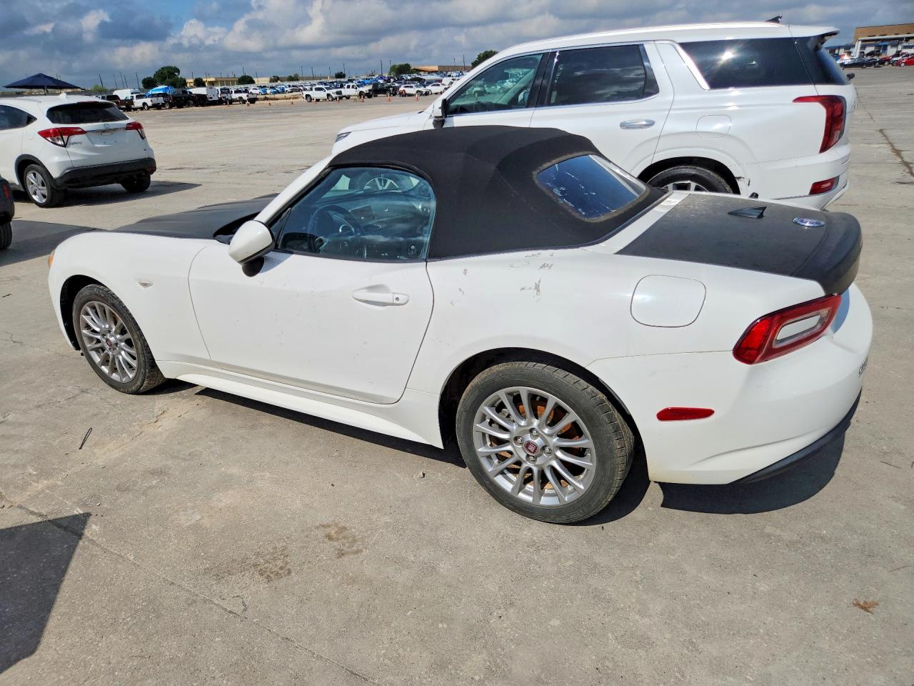 2018 Fiat 124 Spider VIN JC1NFAEK1J0137502 COPART salvage auction — Normal Wear, AR - CERTIFICATE OF TITLE (P), sold $4,350 on 2026-07-09 (photo 2)