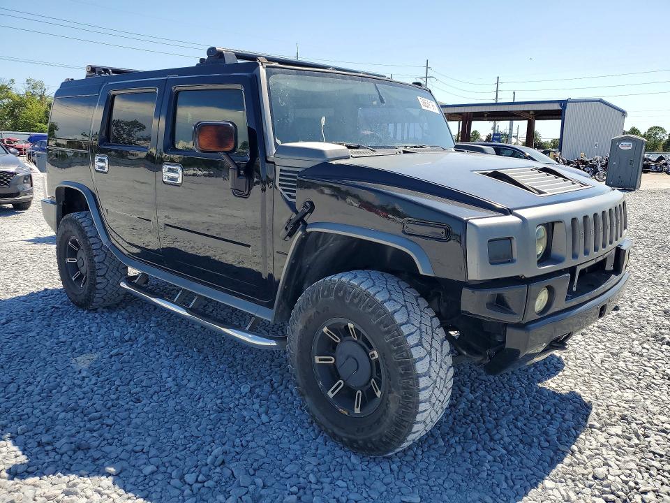 2003 Hummer H2 VIN 5GRGN23U03H120685 COPART salvage auction — MINOR DENT/SCRATCHES, Fl - Cert Of Title-Rebuilt, sold $1,600 on 2026-07-10 (photo 4)