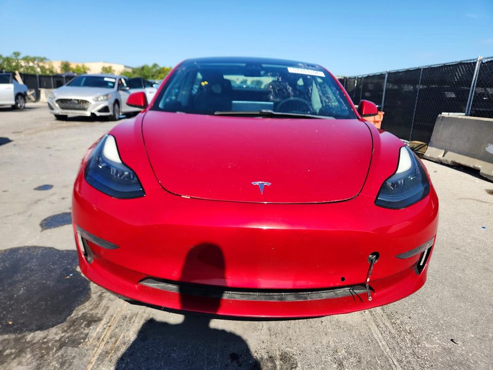 2021 Tesla Model 3 VIN 5YJ3E1EBXMF902886 COPART salvage auction — MINOR DENT/SCRATCHES, Fl - Certificate Of Title, sold $11,100 on 2026-07-27 (photo 5)