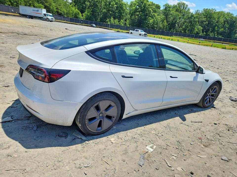 2022 Tesla Model 3 VIN 5YJ3E1EA0NF369441 COPART salvage auction — SIDE, Va - Certificate Of Title, sold $9,000 on 2026-07-08 (photo 3)