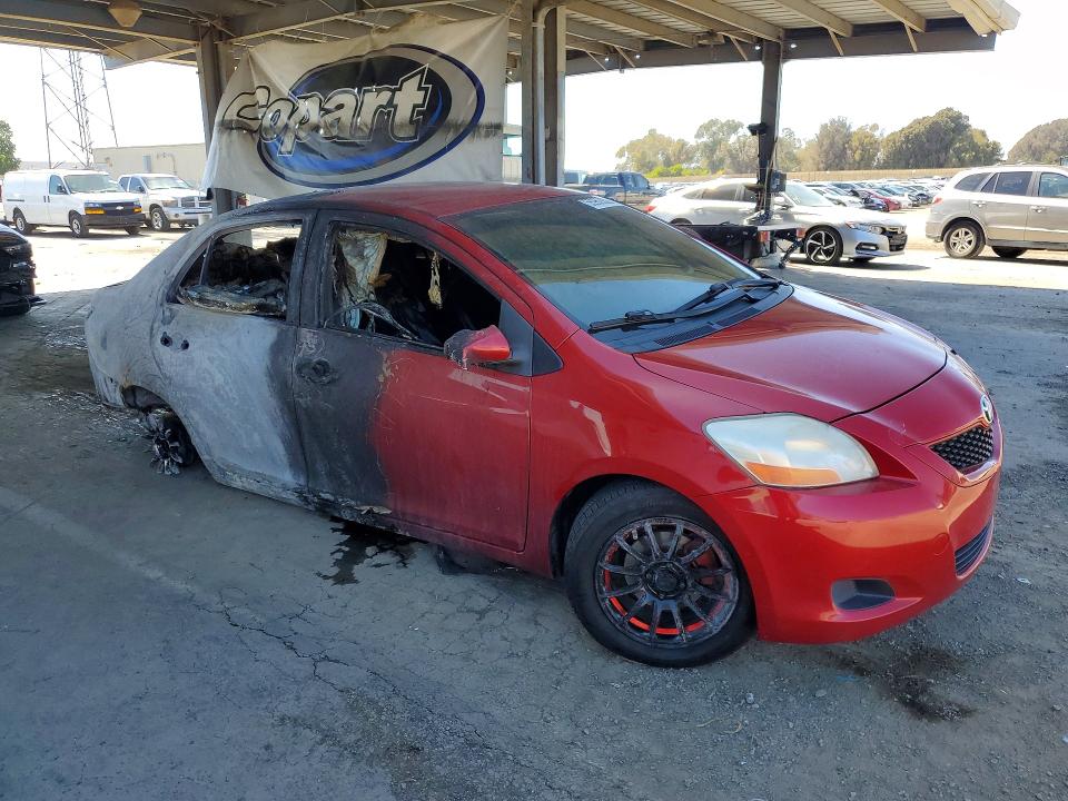 2010 Toyota Yaris VIN JTDBT4K38A4068264 COPART salvage auction — BURN, CA - NON-REPAIRABLE VEHICLE CERT, sold $100 on 2026-07-09 (photo 4)