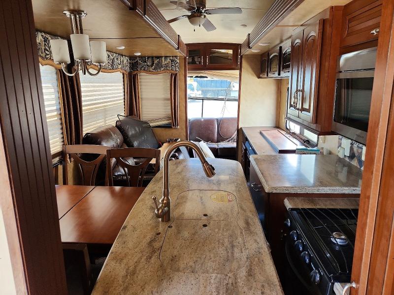 2014 Cedar creek Fifth wheel VIN 4X4FCRM22ES210283 COPART salvage auction — ALL OVER, IL - SALVAGE CERTIFICATE, sold $1,700 on 2026-07-30 (photo 6)