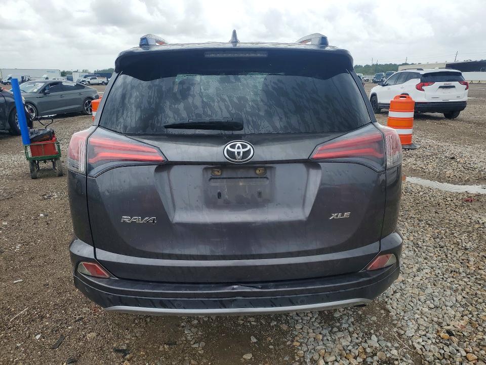 2017 Toyota Rav 4 VIN JTMWFREV5HJ712690 COPART salvage auction — SIDE, Tx - Salvage Vehicle Title, sold $5,700 on 2026-07-06 (photo 6)