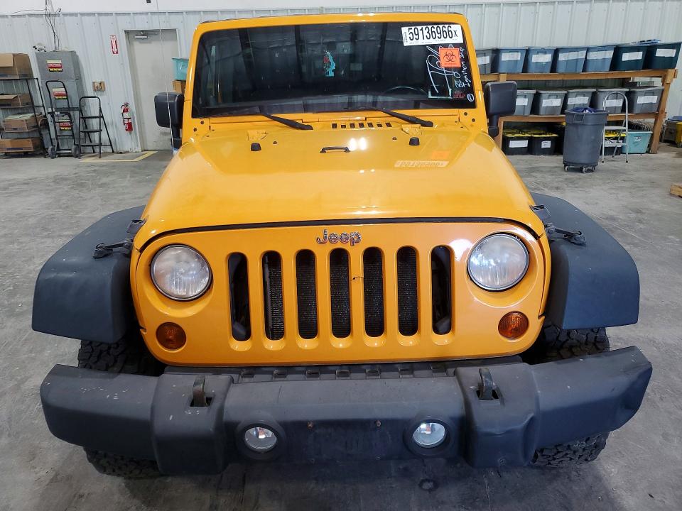 2013 Jeep Wrangler unlimited VIN 1C4BJWDG3DL557117 COPART salvage auction — NORMAL WEAR, VA - CERTIFICATE OF TITLE, sold $2,450 on 2026-09-02 (photo 5)