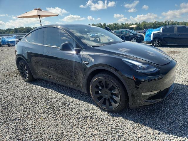 2024 Tesla VIN 7SAYGAEE2RF064423 COPART salvage auction — SIDE, Fl - Cert Of Title Slvg Rebuildable, sold $18,400 on 2026-07-10 (photo 4)